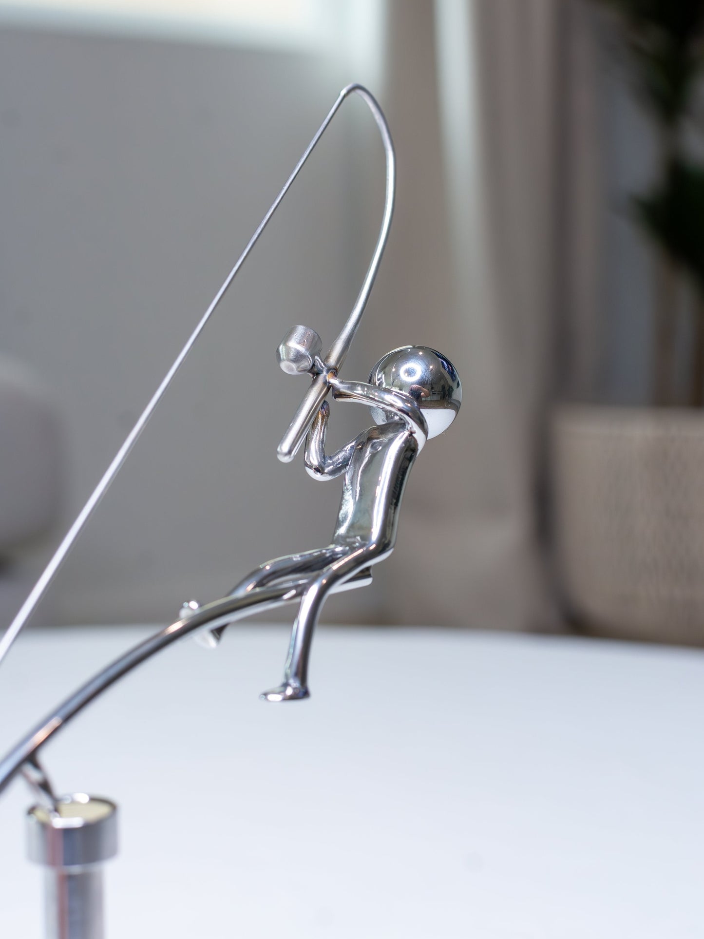 đŁSkulpturen med balanserende fisker