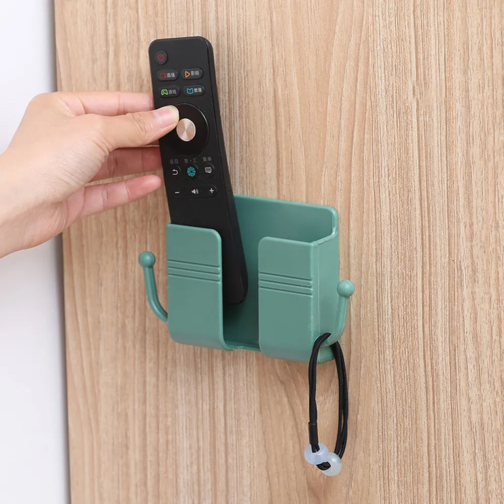 🔥 50% RABATT 📱 Fjärrkontroll & mobiltelefon väggförvaring ✨ Smart kontakt-väggmonterad hållare – organiserat, snyggt & praktiskt i hemmet 🏡