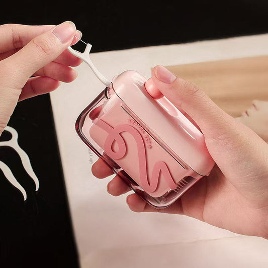 Automatisk popup-dispenser för tandtråd